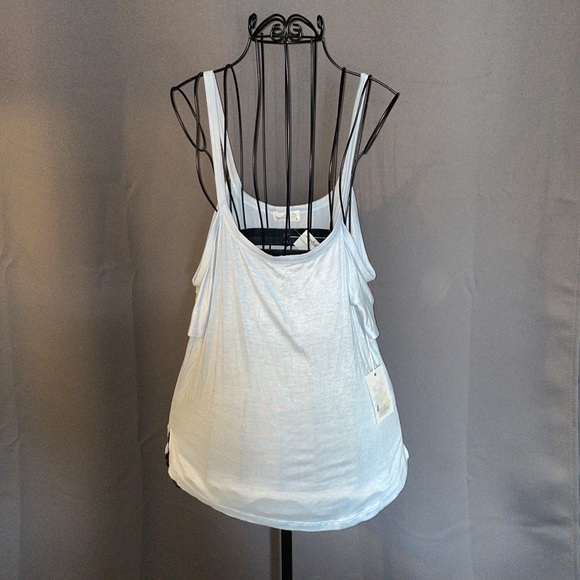 Glitz Tops - NWT.  Glitz.  Women’s size Small Sky Blue spaghetti top